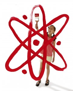 Image of girl painting an atom