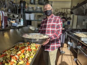 Cover photo for Local Restaurateur Donates Meals Every Week to Help Families