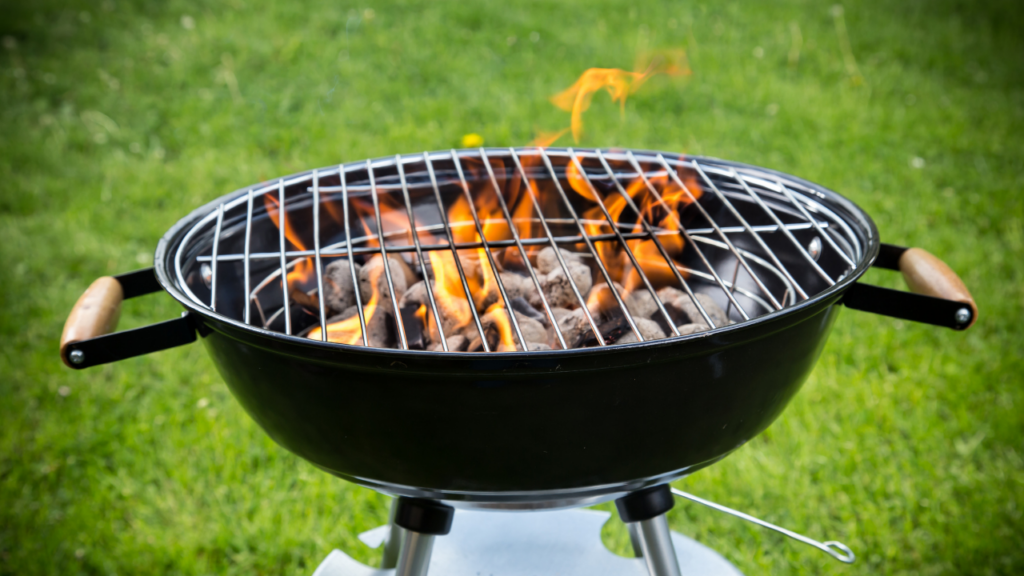 Charcoal grill with flame